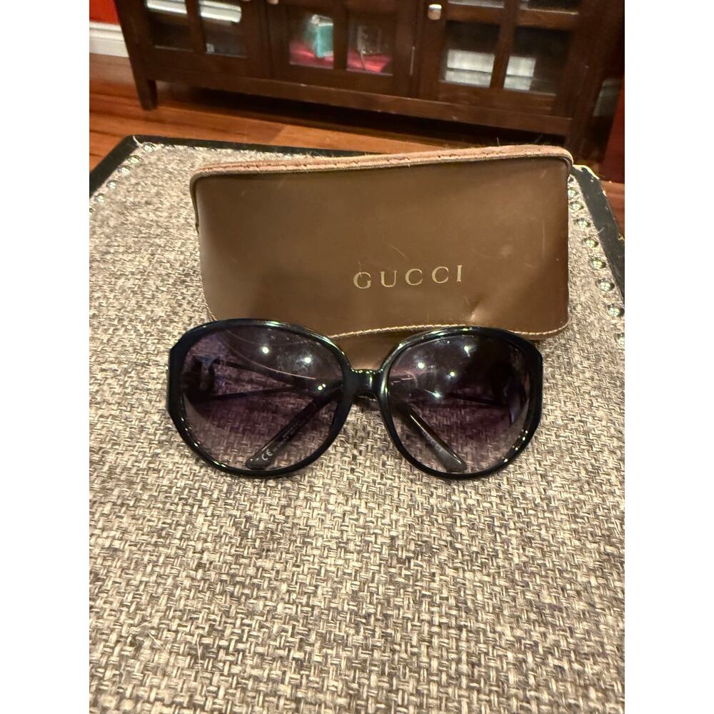 Authentic Vintage Gucci sunglasses in original case.